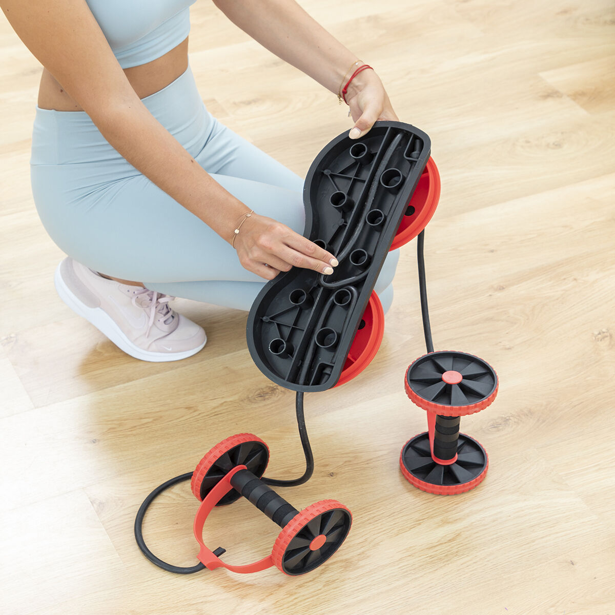 Abdominal Roller with Rotating Discs, Elastic Bands and Exercise Guide